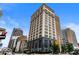 Low angle view of a commercial building with a clear blue sky at 110 Washington St # 301, Indianapolis, IN 46204