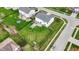 Birds-eye view of a home showcasing the spacious backyard, patio and garden bed at 11631 Tamarisk Blvd, Fishers, IN 46037