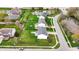 Aerial view of homes with waterfront views and landscaped green spaces at 11631 Tamarisk Blvd, Fishers, IN 46037