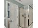 This bathroom features a shower and tub combination with natural light entering in the background at 11631 Tamarisk Blvd, Fishers, IN 46037