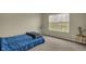 Bedroom featuring carpet floors, a comfortable bed and a bright window view at 11631 Tamarisk Blvd, Fishers, IN 46037