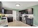 Lovely eat-in kitchen featuring stainless steel appliances, tile floors, and abundant counter space at 11631 Tamarisk Blvd, Fishers, IN 46037