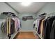 Well-organized walk-in closet with hanging rods and shelving providing ample storage space at 11631 Tamarisk Blvd, Fishers, IN 46037