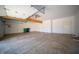 Spacious two car garage with storage cabinets, concrete floors, and automatic door at 130 Governors Ln, Zionsville, IN 46077