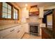 Bright kitchen showcasing granite countertops, stainless steel oven, and custom cabinetry at 130 Governors Ln, Zionsville, IN 46077