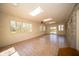 Bright sunroom with stone wall, tile floor, skylights, and windows providing backyard views at 130 Governors Ln, Zionsville, IN 46077