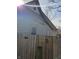 Side view of house showing siding and fence at 1343 W 33Rd St, Indianapolis, IN 46208