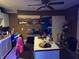 Open kitchen featuring a center island with barstool seating, and stainless steel appliances at 1343 W 33Rd St, Indianapolis, IN 46208