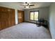 Comfortable bedroom featuring neutral walls and carpet, two closets, and natural light at 1394 Cherry Tree Rd, Avon, IN 46123
