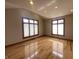 Bright bedroom featuring vaulted ceilings, recessed lighting, and hardwood floors with multiple windows at 1394 Cherry Tree Rd, Avon, IN 46123