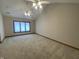 Bedroom with neutral walls, carpeting, and natural light at 1394 Cherry Tree Rd, Avon, IN 46123
