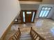 Bright foyer with hardwood floors and a grand staircase at 1394 Cherry Tree Rd, Avon, IN 46123