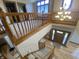 Grand foyer with hardwood floors, a large chandelier, and a staircase at 1394 Cherry Tree Rd, Avon, IN 46123