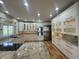 Bright kitchen with granite countertops, stainless steel appliances, island cooktop, and abundance of cabinetry at 1394 Cherry Tree Rd, Avon, IN 46123
