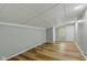 Spacious bedroom featuring light-colored walls, wood-look flooring, and a bright, welcoming atmosphere at 14 Fountain Lake Dr, Greenfield, IN 46140