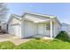 Attractive single-story home with a convenient two-car garage, and classic white siding offering a cozy appeal at 1414 Waldemere Ave, Indianapolis, IN 46241