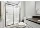 Clean bathroom with shower, modern vanity, and neutral color palette at 14413 Arnett Dr, Carmel, IN 46033