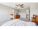 Neutral toned bedroom featuring an ensuite bath and walk out to overlook at 14413 Arnett Dr, Carmel, IN 46033
