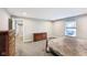 A comfortable bedroom with a window, bed, dresser, and closet for storage at 14413 Arnett Dr, Carmel, IN 46033
