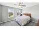 Bedroom features two large windows providing ample natural light and a ceiling fan at 14413 Arnett Dr, Carmel, IN 46033