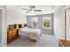 Bedroom with two large windows providing ample natural light and a ceiling fan at 14413 Arnett Dr, Carmel, IN 46033