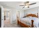 This bedroom has carpeted floors, gray paint, and wood furniture at 14413 Arnett Dr, Carmel, IN 46033