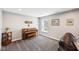 Versatile room with piano, comfortable seating, and natural light, perfect for relaxation at 14413 Arnett Dr, Carmel, IN 46033