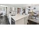Bright kitchen island offers ample counter space, sleek appliances, and an inviting design at 14413 Arnett Dr, Carmel, IN 46033