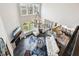 Top-down view of open-concept living room with hardwood floors and easy access to kitchen at 14413 Arnett Dr, Carmel, IN 46033