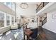 Spacious living room with soaring ceilings, large windows, and hardwood floors at 14413 Arnett Dr, Carmel, IN 46033