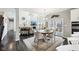 Open-concept layout with seamless transition between the living room, dining area, and kitchen at 14413 Arnett Dr, Carmel, IN 46033