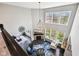 Aerial view of a spacious living room with fireplace, lots of windows and hardwood floors at 14413 Arnett Dr, Carmel, IN 46033