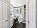 Office space featuring built-in storage, desk, and natural light from the window at 14413 Arnett Dr, Carmel, IN 46033