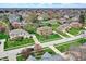 Residential neighborhood with manicured lawns and diverse home styles at 1444 Trail Creek Ct, Carmel, IN 46032