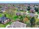 Aerial shot of homes in a residential area with mature landscaping at 1444 Trail Creek Ct, Carmel, IN 46032