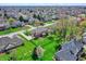 Gathering-friendly neighborhood with lush green lawns and various architectural home styles at 1444 Trail Creek Ct, Carmel, IN 46032