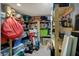 Storage room in the basement with shelves holding various storage items at 1444 Trail Creek Ct, Carmel, IN 46032