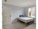 Bedroom with a twin bed, a storage area, and a window to let in natural light at 1444 Trail Creek Ct, Carmel, IN 46032