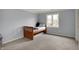 Cozy bedroom with a twin bed, soft carpet and natural light from the window at 1444 Trail Creek Ct, Carmel, IN 46032