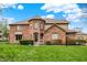 Charming brick home with a well-maintained lawn and lush green bushes at 1444 Trail Creek Ct, Carmel, IN 46032