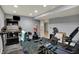 Basement gym area featuring workout equipment and neutral decor at 1444 Trail Creek Ct, Carmel, IN 46032