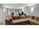 Finished basement with carpeted floors, comfy couch, and recessed lighting at 1444 Trail Creek Ct, Carmel, IN 46032