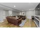 Finished basement with entertainment area and large sectional at 15385 Ellington Dr, Fishers, IN 46040