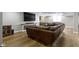 Finished basement featuring fireplace, wet bar, TV, and large sectional at 15385 Ellington Dr, Fishers, IN 46040