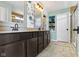 A modern bathroom with double sinks, new cabinets, and stylish decor at 15385 Ellington Dr, Fishers, IN 46040