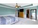 Bright bedroom featuring fresh paint, carpet, and view to bathroom at 15385 Ellington Dr, Fishers, IN 46040