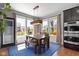 Inviting dining room featuring natural light and views of the outdoors at 15385 Ellington Dr, Fishers, IN 46040