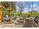 Outdoor firepit area featuring Adirondack chairs and a gravel base, ideal for cozy evenings at 15385 Ellington Dr, Fishers, IN 46040