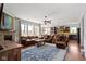 Bright and spacious living room with open floor plan to kitchen and dining area at 15385 Ellington Dr, Fishers, IN 46040