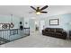 Upstairs living area featuring a comfortable couch, plush carpet, and light blue walls at 15385 Ellington Dr, Fishers, IN 46040